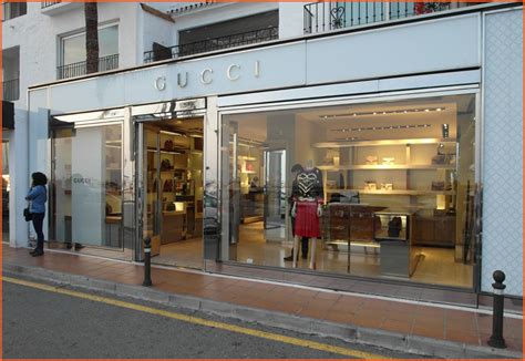 Shops with GUCCI in Marbella title.